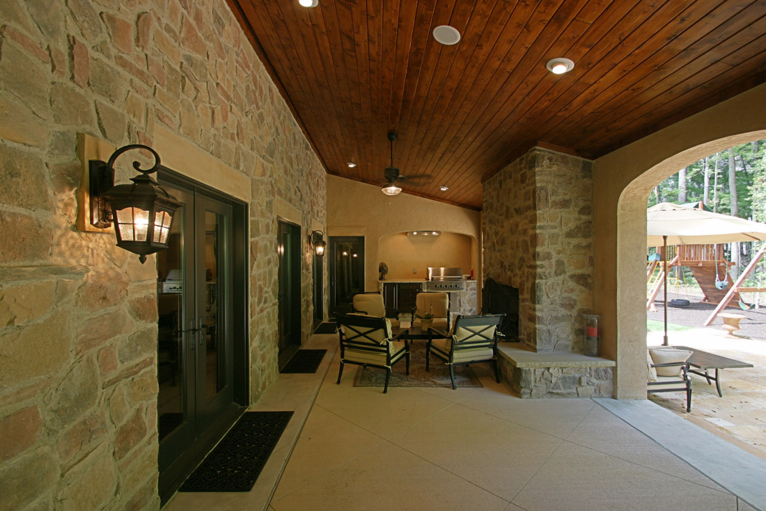tuscan custom home covered porch