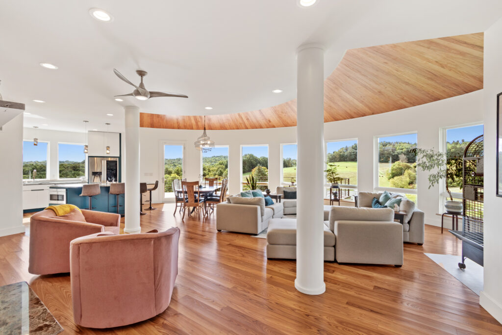 curved living room lots of windows