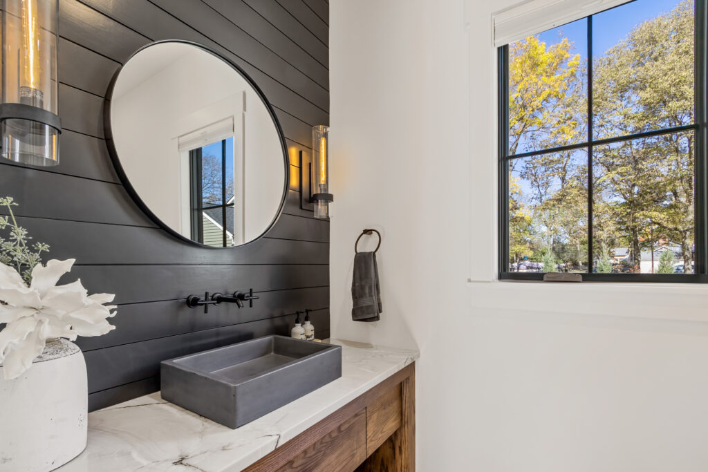 custom home mudroom hall bath black shiplap accent wall