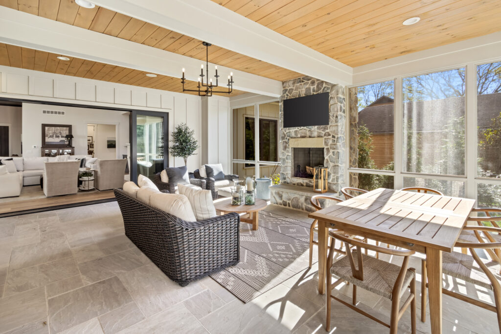 screened porch stone fireplace custom home